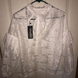 Lace ruffle sleeve top with tie neck